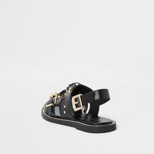 Black faux leather chain trim sandals
