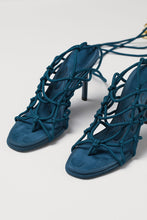 Sandals with lacing